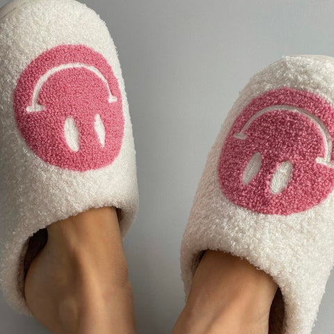 Customer wearing the "Comfiest & Cutest" Smile Slippers from Selfcare Social, Australia