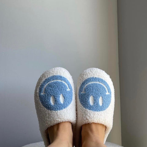 Customer wearing the "Comfiest & Cutest" Smile Slippers from Selfcare Social, Australia