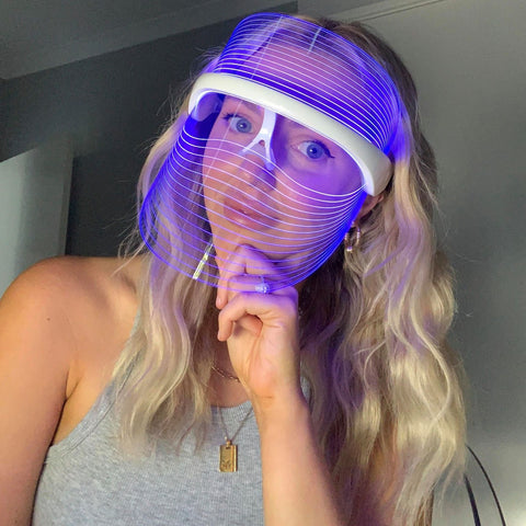 "A customer using blue, red & amber LED light therapy face masks for skin by Selfcare Social, Australia"